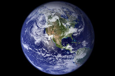 The image of Earth in space like a blue marble highlighted the planets fragility and the beauty of Earth.
